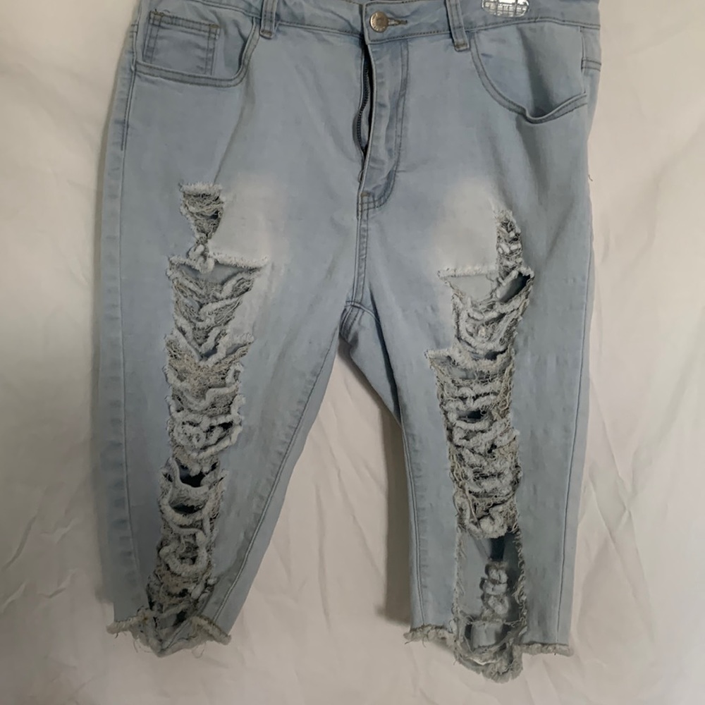L light wash ripped Bermuda jean shorts